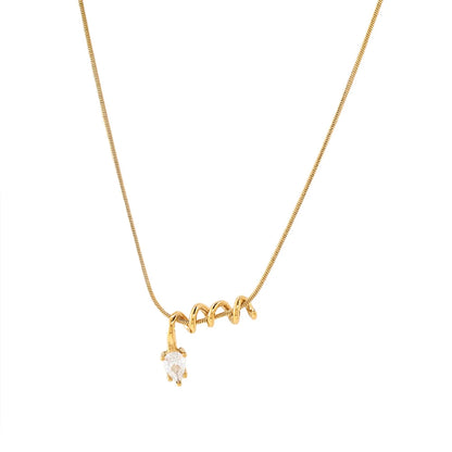 Gold necklace with a small pendant on a white background